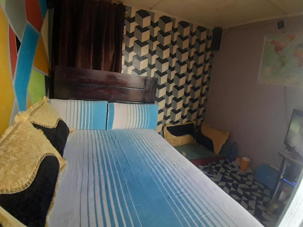 Llit o llits en una habitació de Paw's Cozy room