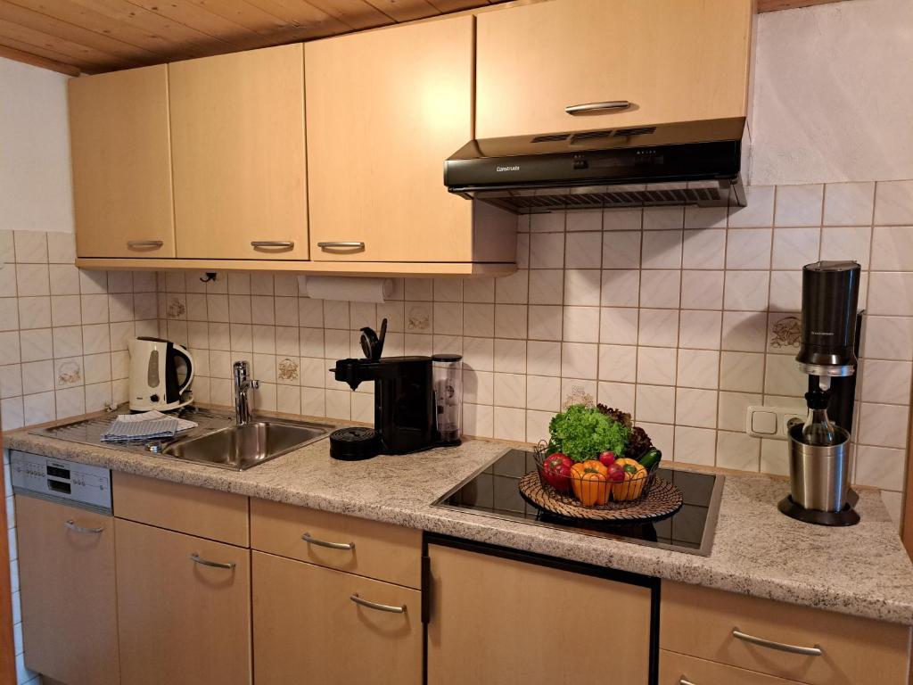 Kuchyň nebo kuchyňský kout v ubytování Ferienwohnung Hartmann