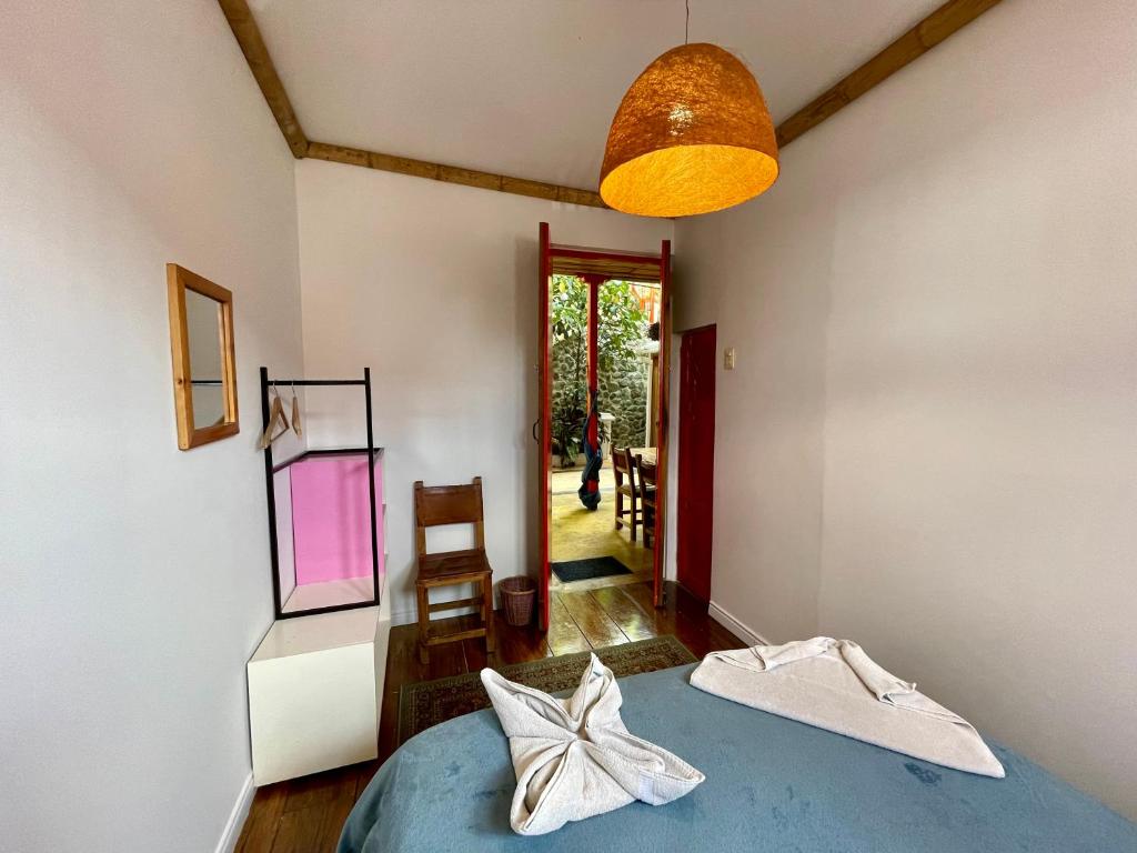 Llit o llits en una habitació de Hostal Tralala Salento