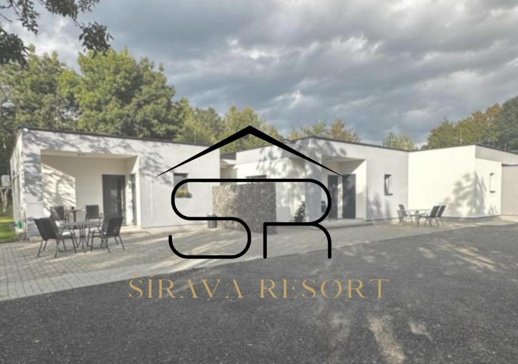 eine Darstellung eines Hauses mit den Worten stayva resort in der Unterkunft Šírava Resort in Klokočov