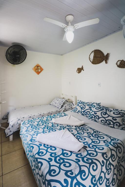 Cama ou camas em um quarto em Hostel Cabo Frio