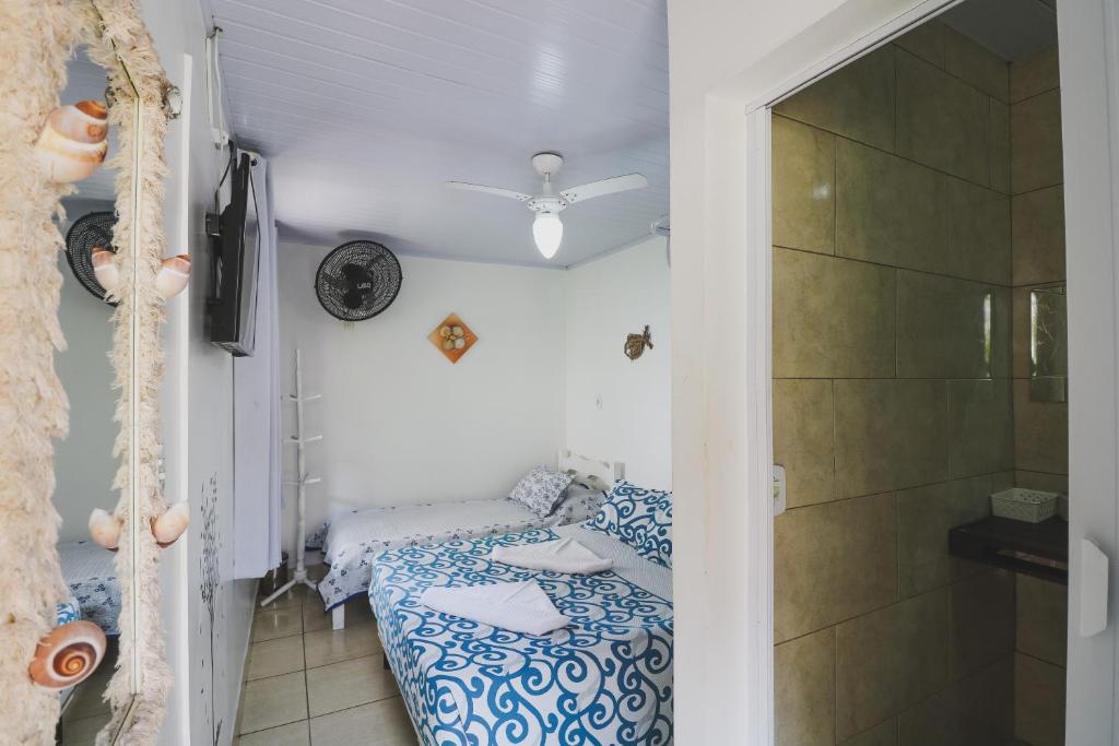 Cama ou camas em um quarto em Hostel Cabo Frio