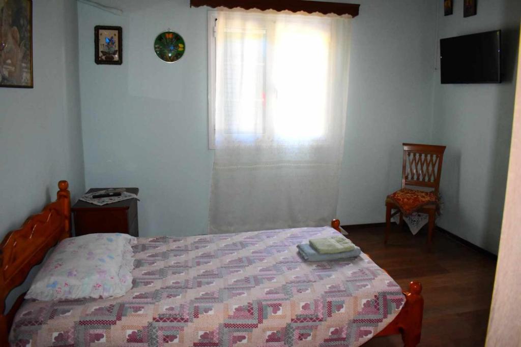 Postel nebo postele na pokoji v ubytování Ostriche House
