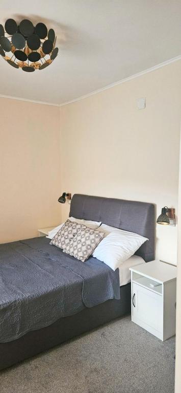 Postel nebo postele na pokoji v ubytování Kuća Schunko