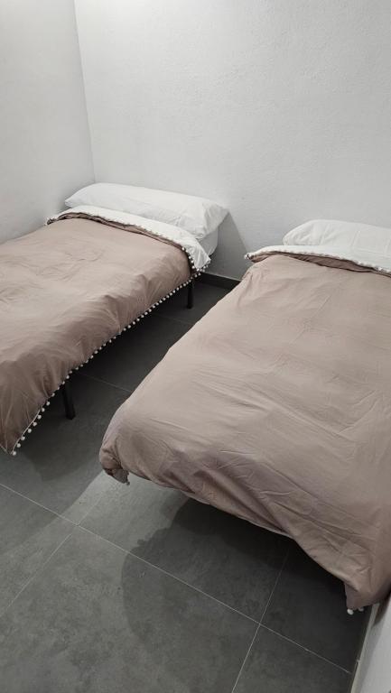 Postel nebo postele na pokoji v ubytování Cuevas CEMAR