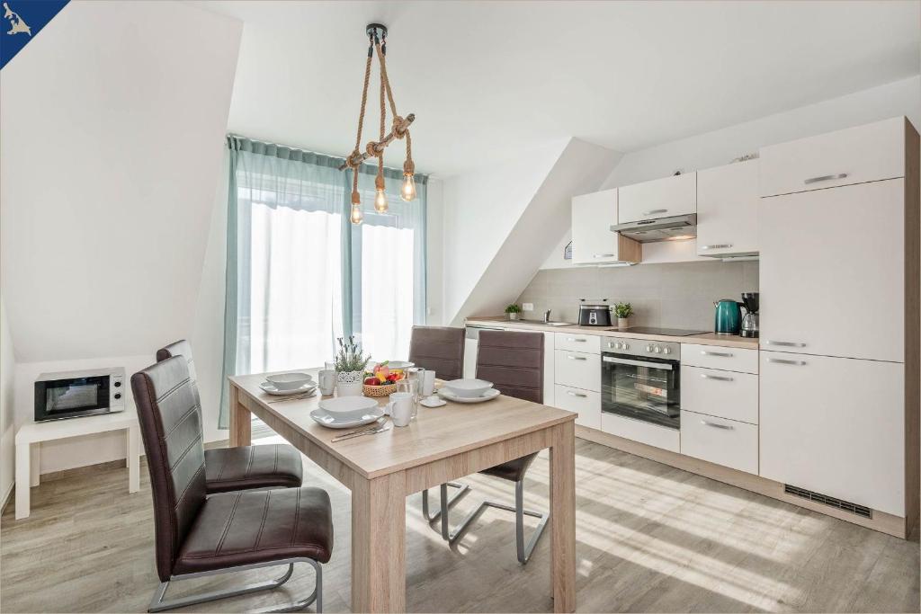 Kuchyň nebo kuchyňský kout v ubytování Ferienanlage Sonneninsel Haus Himmelblau Obergeschoss