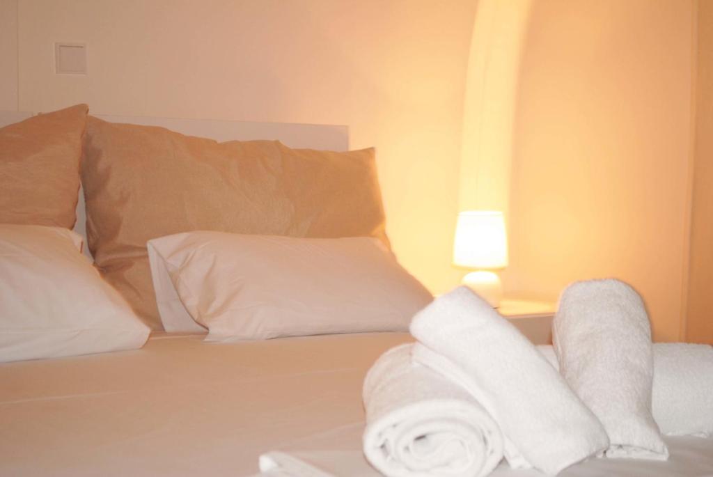 Posteľ alebo postele v izbe v ubytovaní Fevronia's Rooms