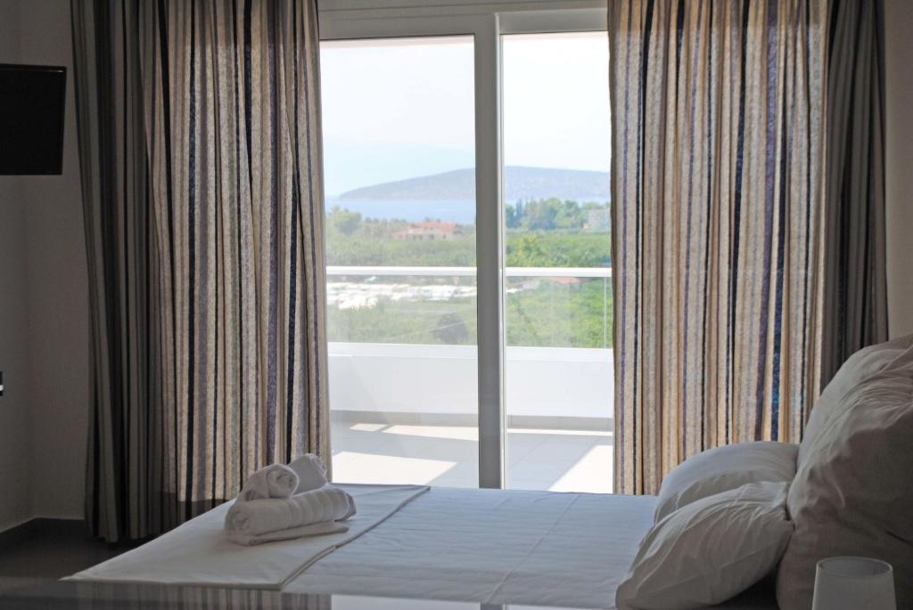 Posteľ alebo postele v izbe v ubytovaní Fevronia's Rooms