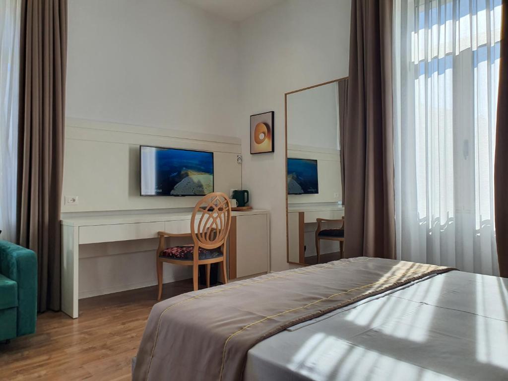 Postel nebo postele na pokoji v ubytování HEIRESS Hotel