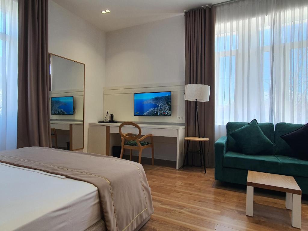 Postel nebo postele na pokoji v ubytování HEIRESS Hotel
