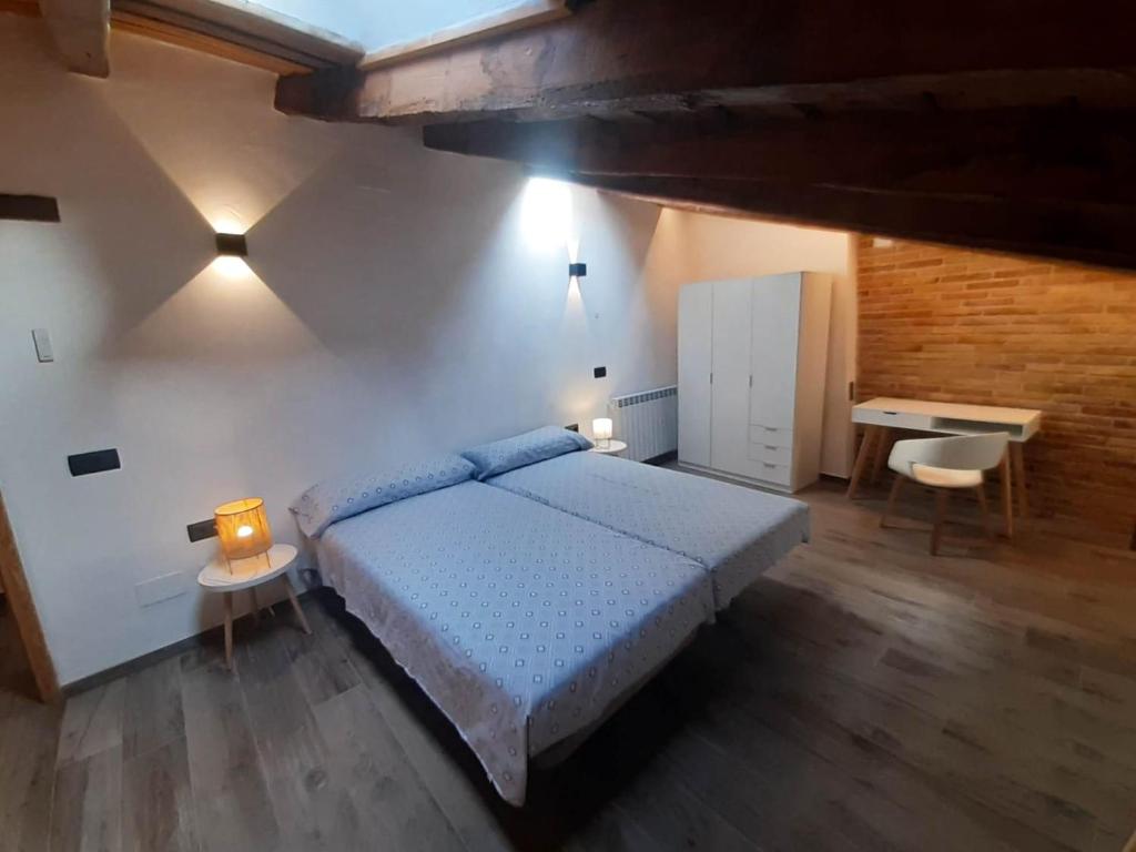 Postel nebo postele na pokoji v ubytování Niu de Queralt