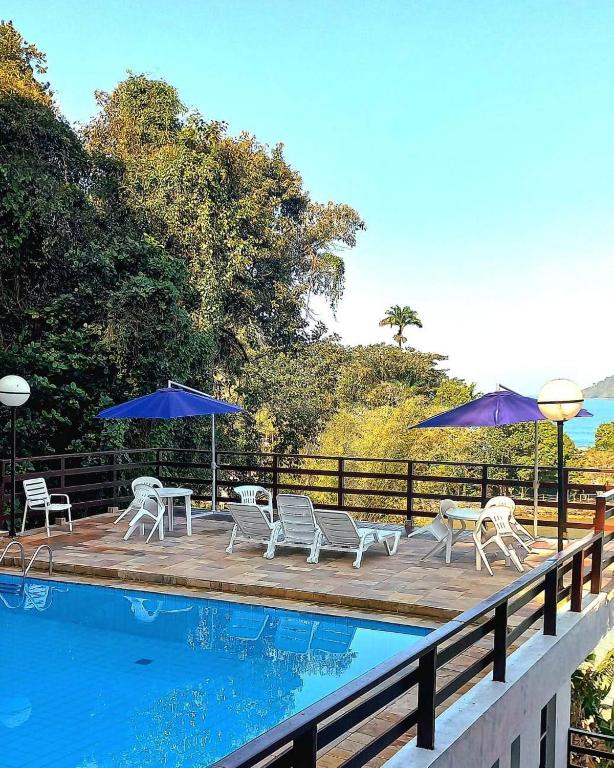 A piscina localizada em Apartamento Ubatuba Terraços da Prainha Vista Mar ou nos arredores