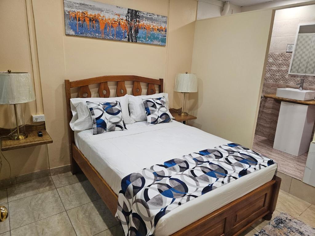Postel nebo postele na pokoji v ubytování Beres Vale Apartments