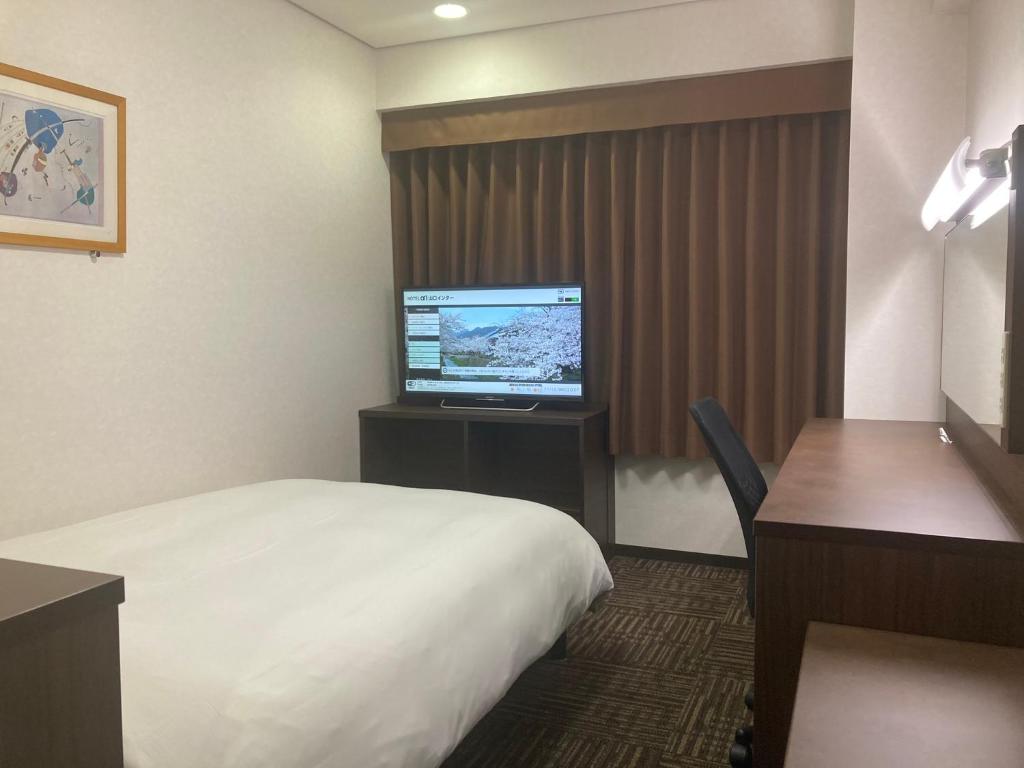 TV a/nebo společenská místnost v ubytování Hotel Alpha-One Yamaguchi Inter