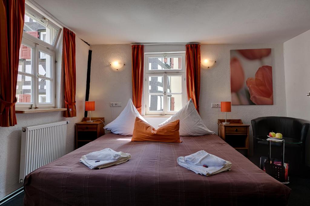 Postel nebo postele na pokoji v ubytování Hotel Kleine Radlerherberge