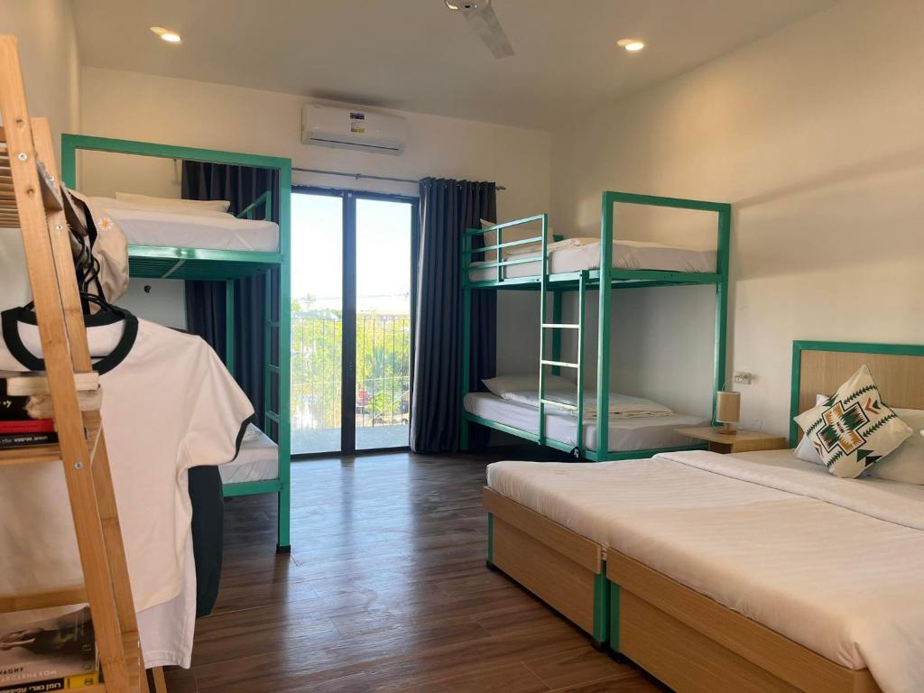 Postel nebo postele na pokoji v ubytování Abraham Bohol