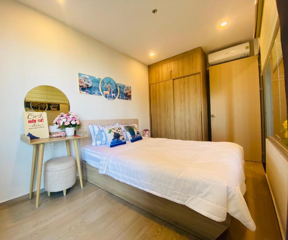 Postel nebo postele na pokoji v ubytování The Song Apartment Vung Tau Sea view