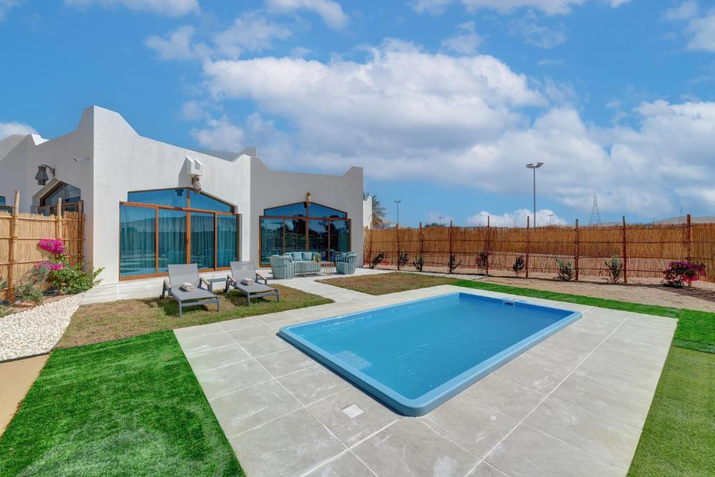 Bazén v ubytování Western Hotel Liwa nebo v jeho okolí