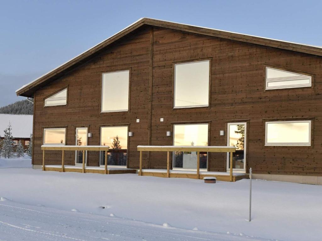 a building with windows in the snow at 12 person holiday home in IDRE in Idre