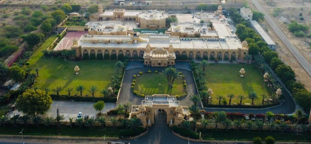 an aerial view of a large building with a garden at Fort Rajwada,Jaisalmer in Jaisalmer