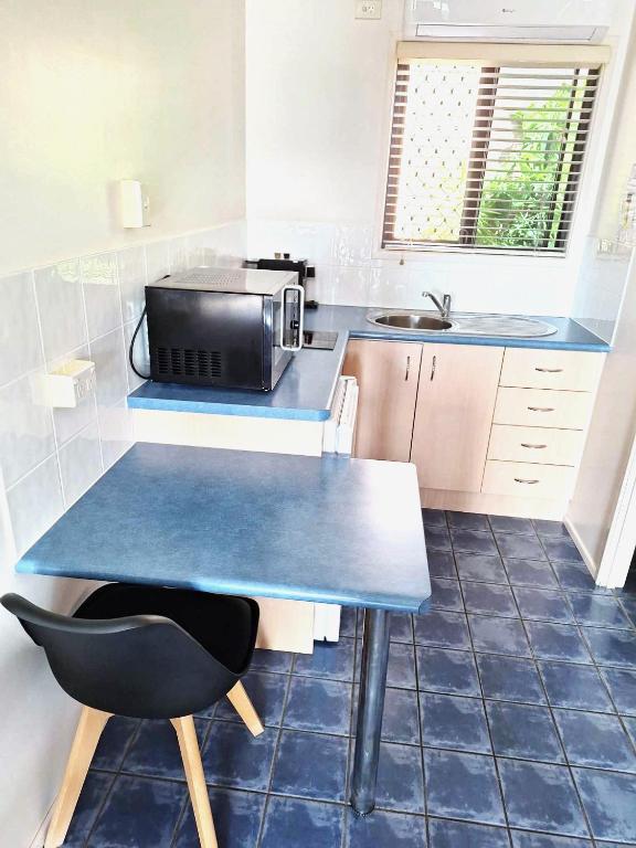 Kuchyň nebo kuchyňský kout v ubytování Central Studio Accommodation