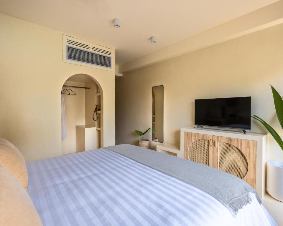 TV a/nebo společenská místnost v ubytování Isla Retreat