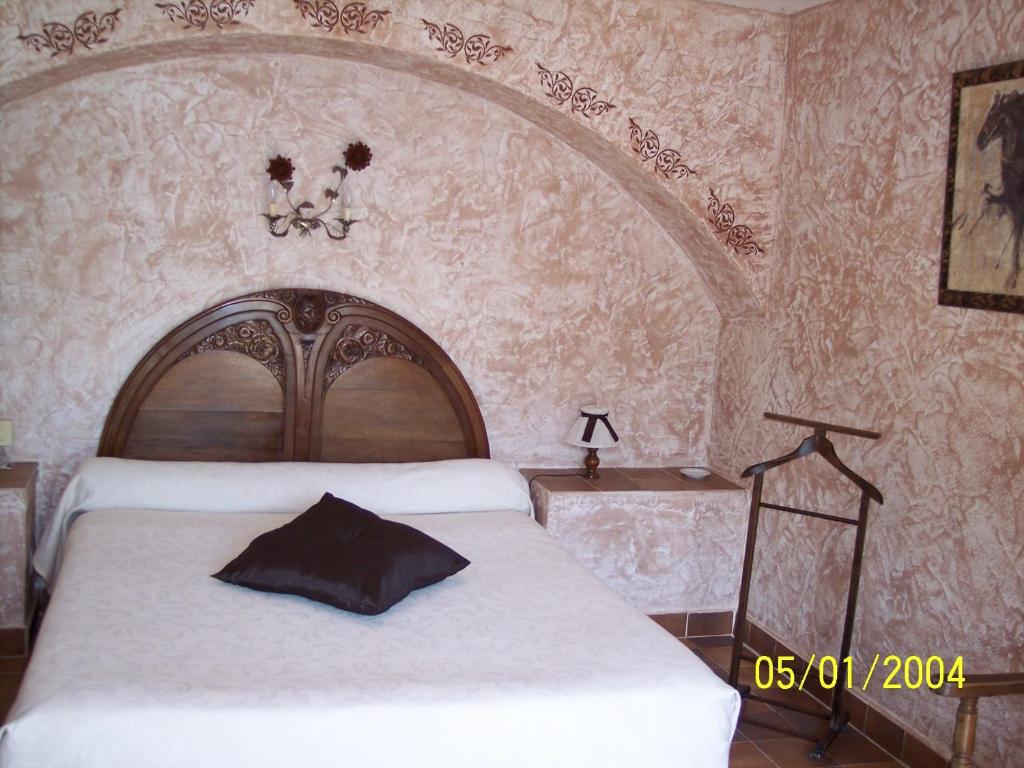 Postel nebo postele na pokoji v ubytování La Pierrerie