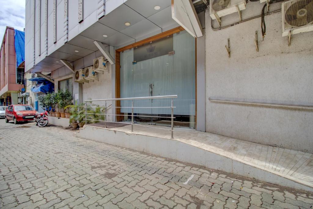 a building with a window on the side of a street at OYO Hotel Address Inn in Mumbai