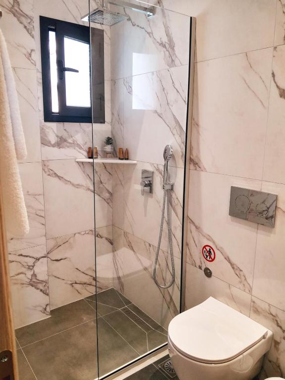 Koupelna v ubytování Anel Rooms