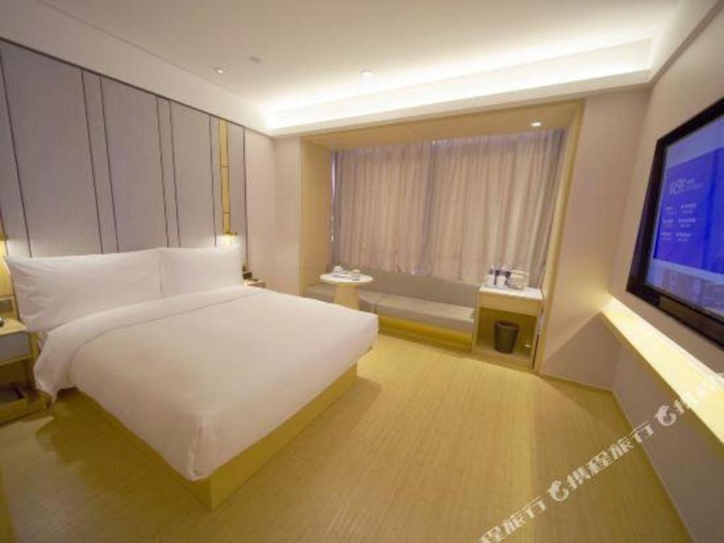 Gulta vai gultas numurā naktsmītnē Ji Hotel Beijing Renmin University Metro Station