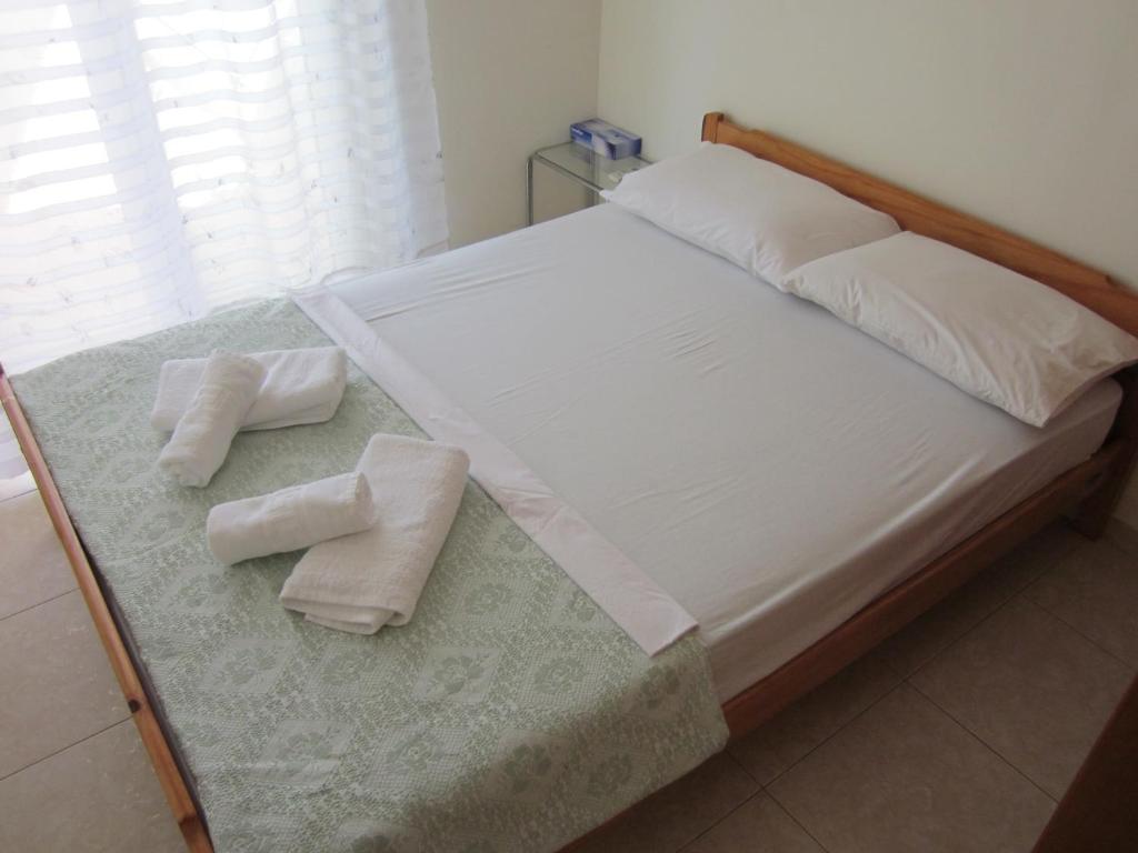 Postel nebo postele na pokoji v ubytování Sunshine Villa