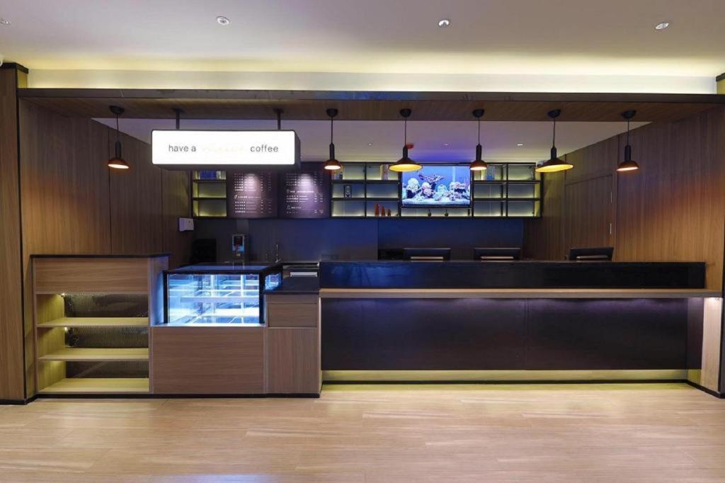 De lobby of receptie bij Hanting Hotel Qingdao Chengyang Wanda Plaza 1St Branch