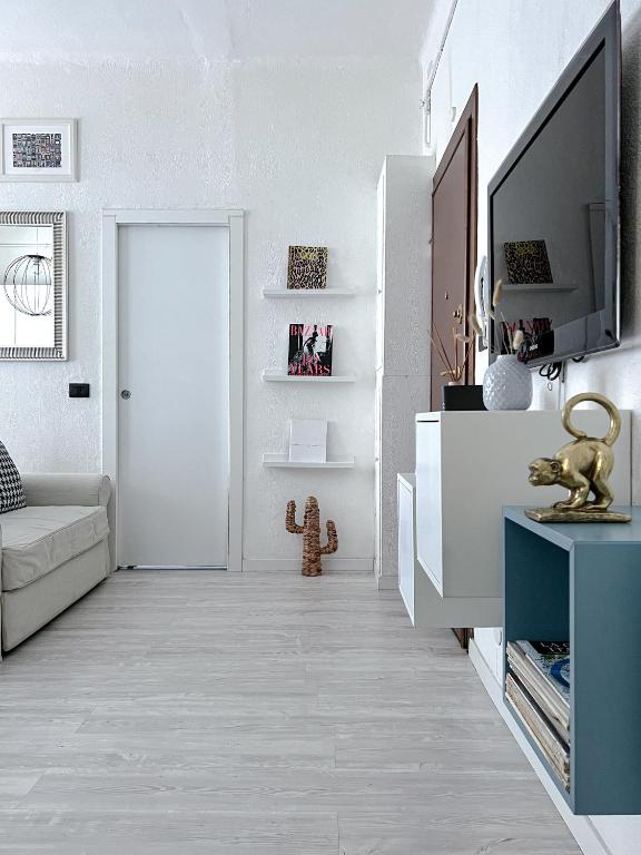 Televízia a/alebo spoločenská miestnosť v ubytovaní The Boutique Houses - Navigli