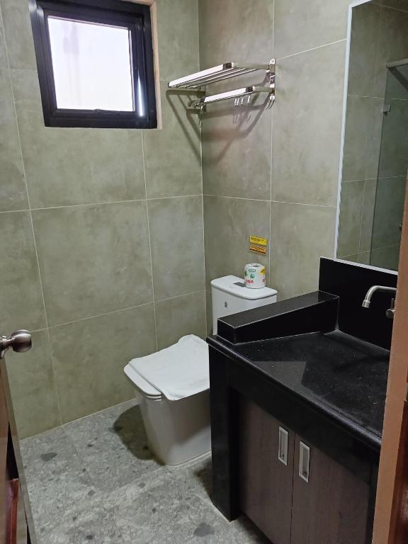 Koupelna v ubytování Norlu Cedec Midpoint Hotel