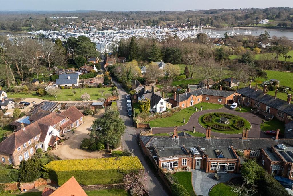 an aerial view of a village with houses at Grange Cottage in Bursledon