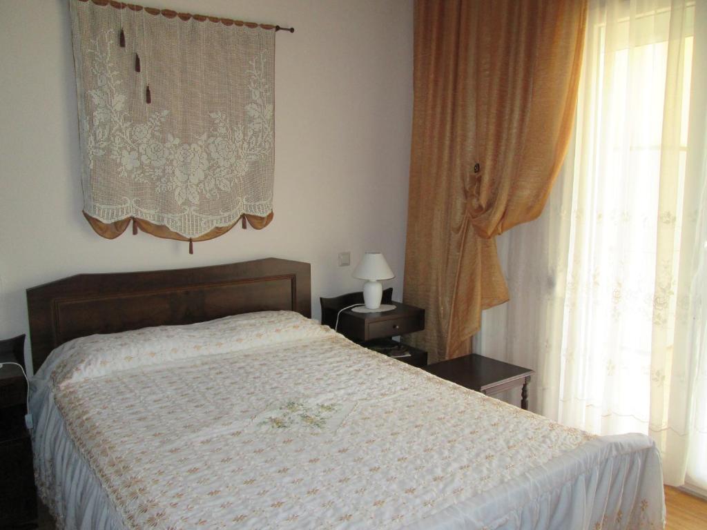 Postel nebo postele na pokoji v ubytování Filomeni's house