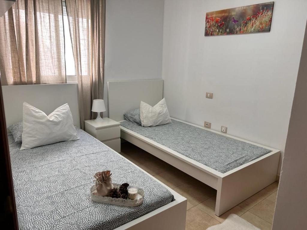 Posteľ alebo postele v izbe v ubytovaní Ático Garajonay