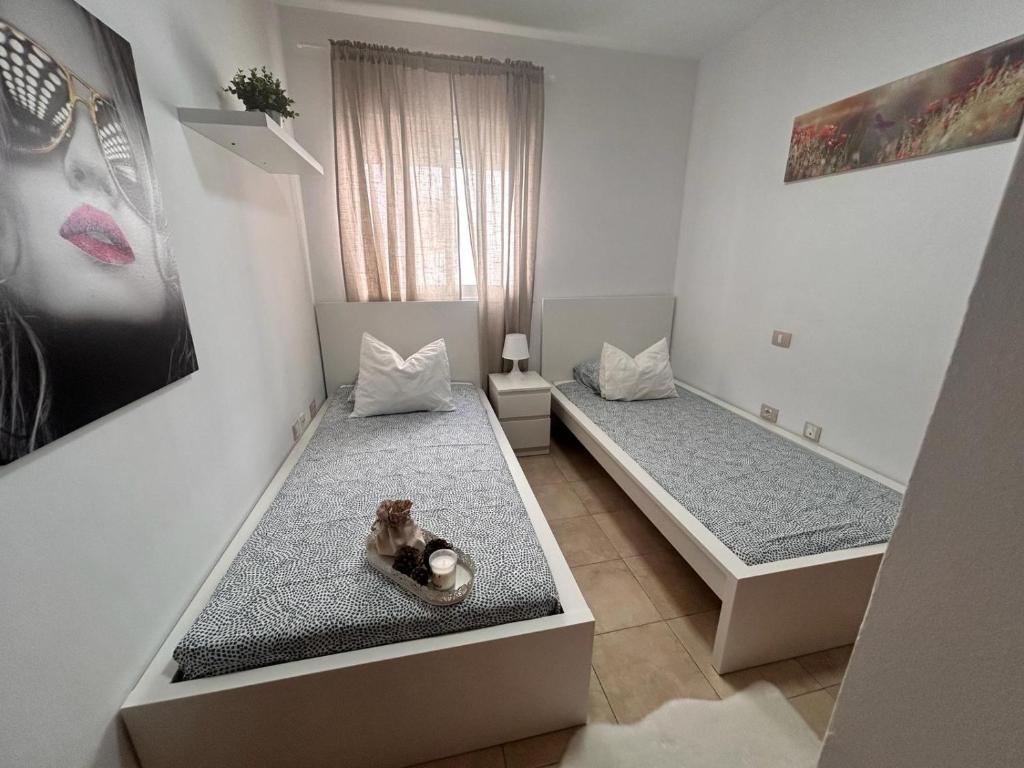 Posteľ alebo postele v izbe v ubytovaní Ático Garajonay