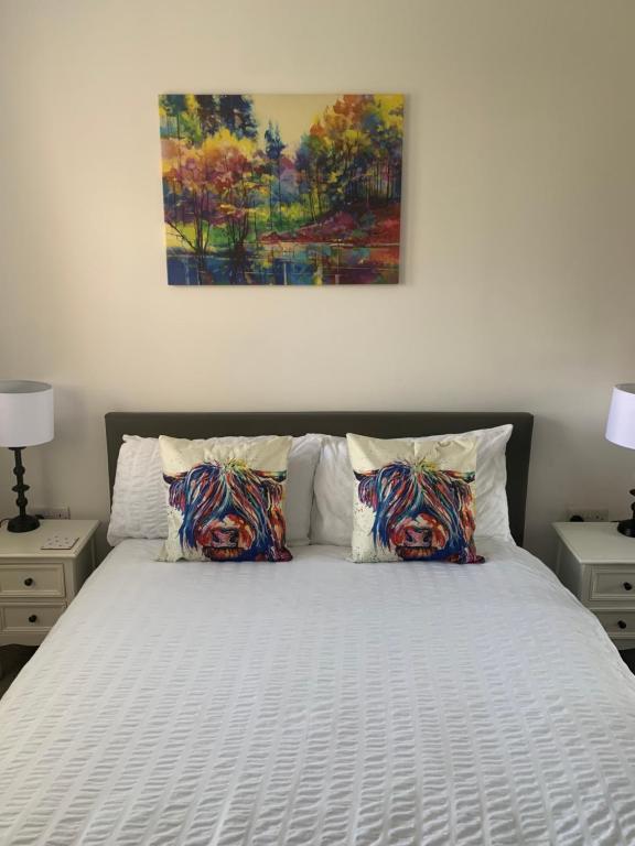 Кровать или кровати в номере New Holliday Villa, Anstruther