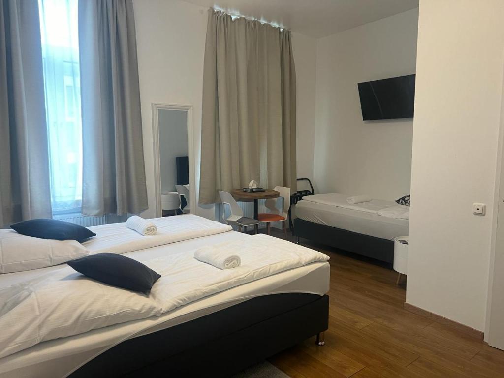 Postel nebo postele na pokoji v ubytování Hotel Soers