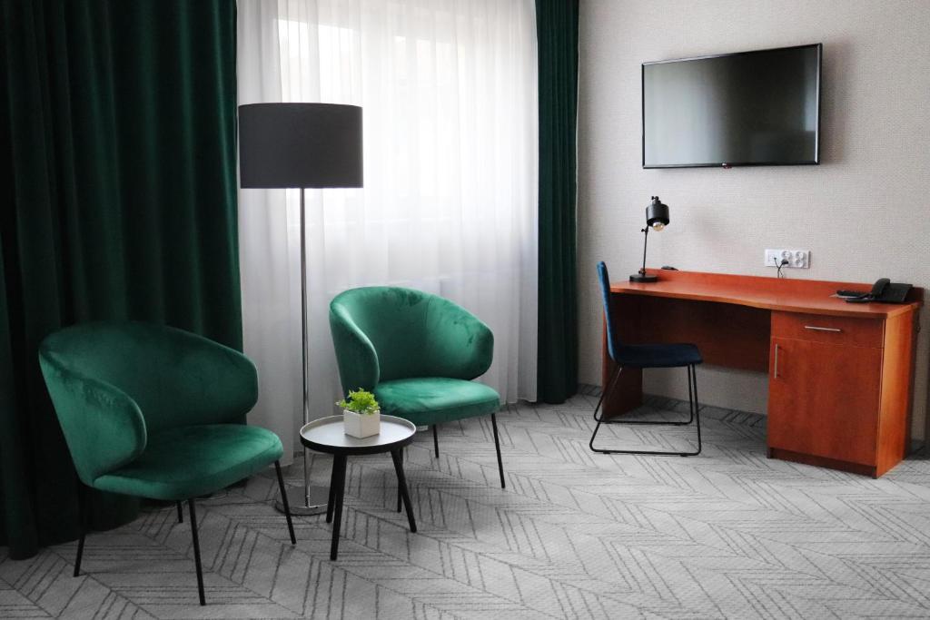 TV a/nebo společenská místnost v ubytování Hotel Polonia Centrum