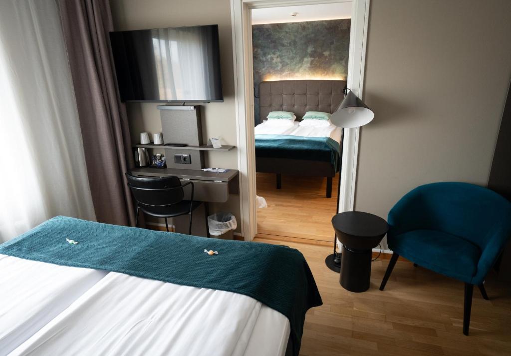 Postel nebo postele na pokoji v ubytování Best Western Hotel Vidöstern