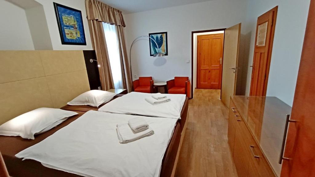 Posteľ alebo postele v izbe v ubytovaní Apartments Gato Karlovy Vary Dalovice