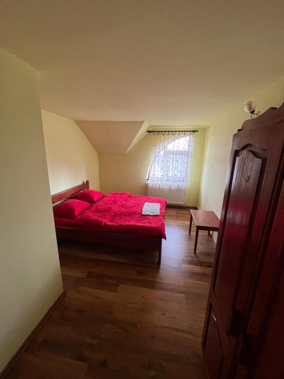 Postel nebo postele na pokoji v ubytování Casa Matis Mărișel