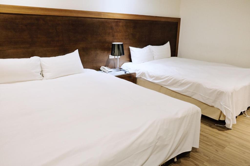 Postel nebo postele na pokoji v ubytování Yoai Nemuru Inn