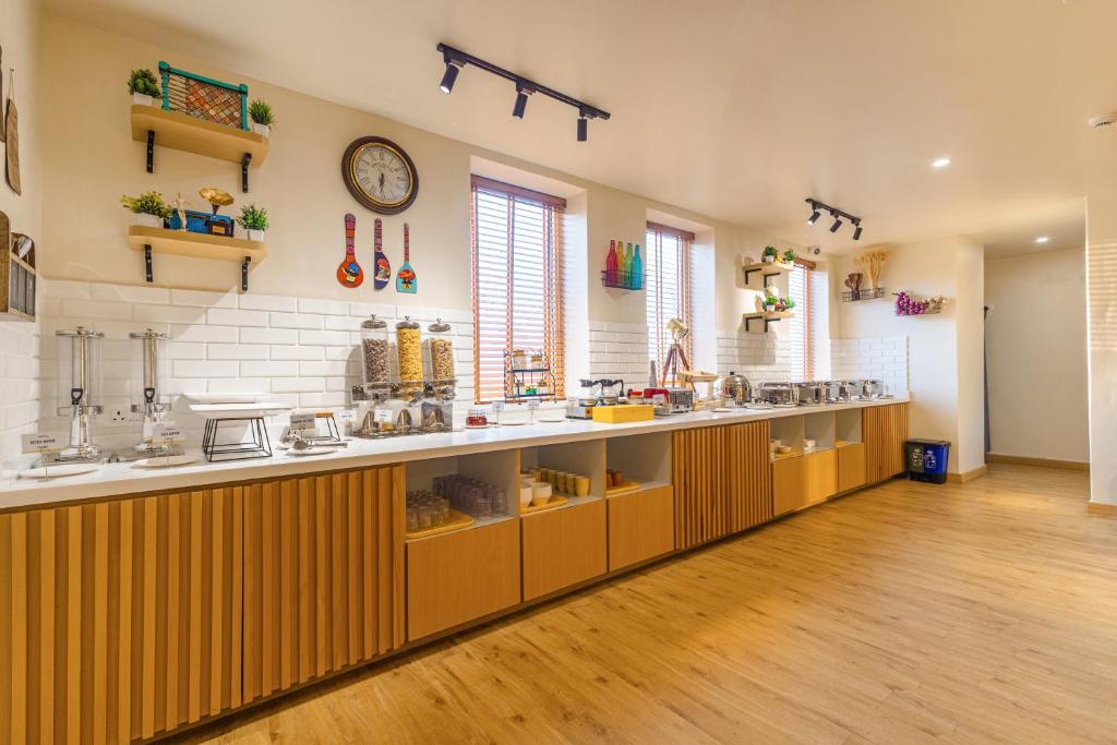 Kuchyň nebo kuchyňský kout v ubytování Bloom Hotel - Ranchi