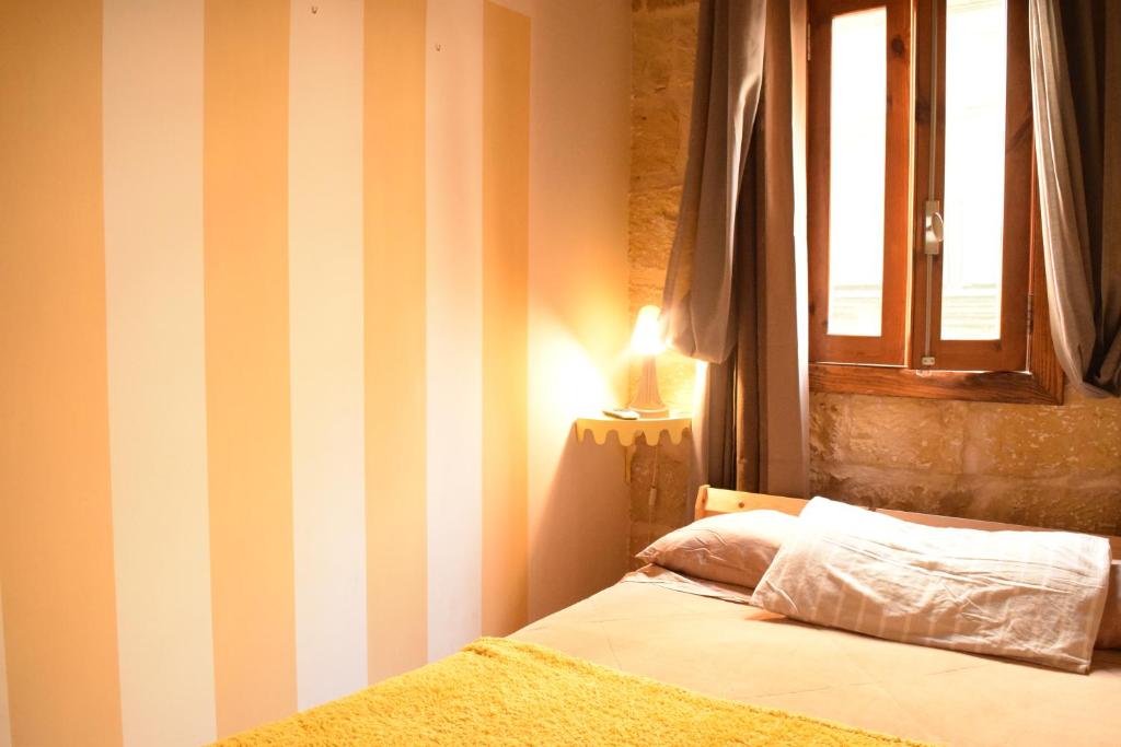 Postel nebo postele na pokoji v ubytování St George of Lydda B&B