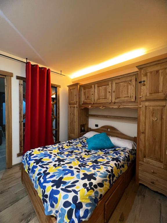 Postel nebo postele na pokoji v ubytování Cervinia – Matterhorn Apartments