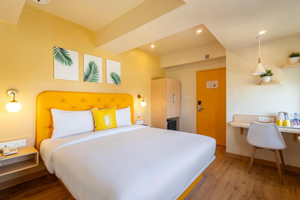 Postel nebo postele na pokoji v ubytování Bloom Hotel - Ranchi