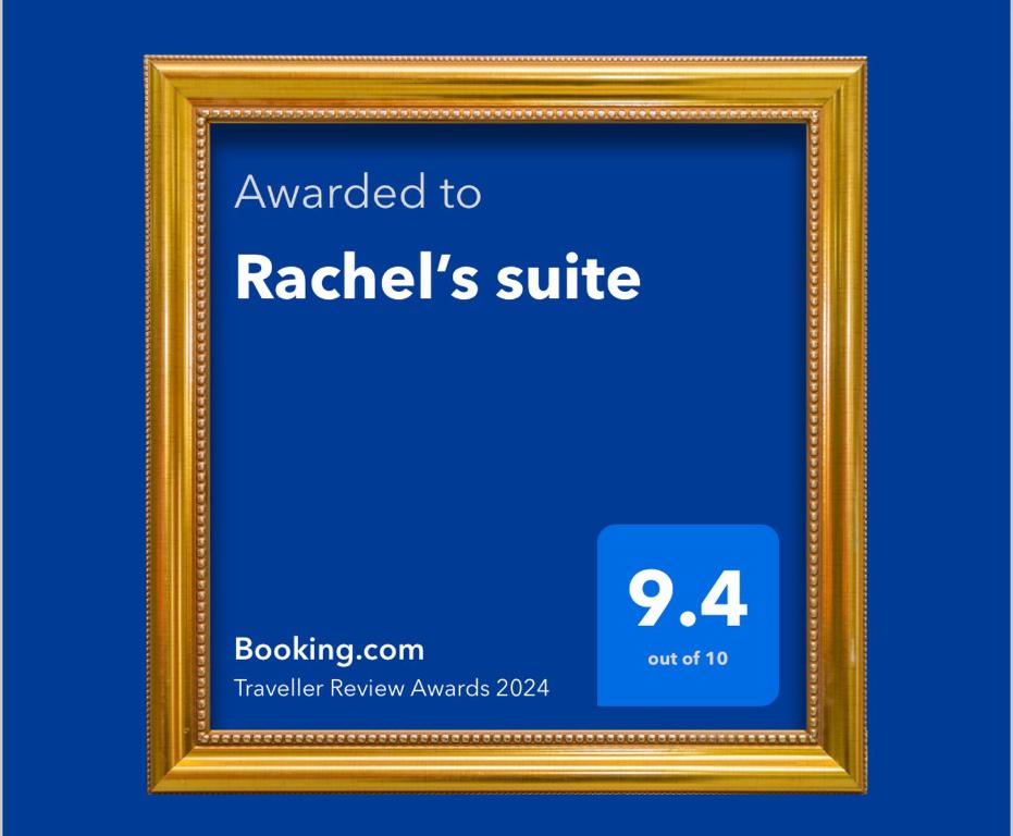 a gold picture frame with a blue background at Rachel’s suite in Roquetas de Mar